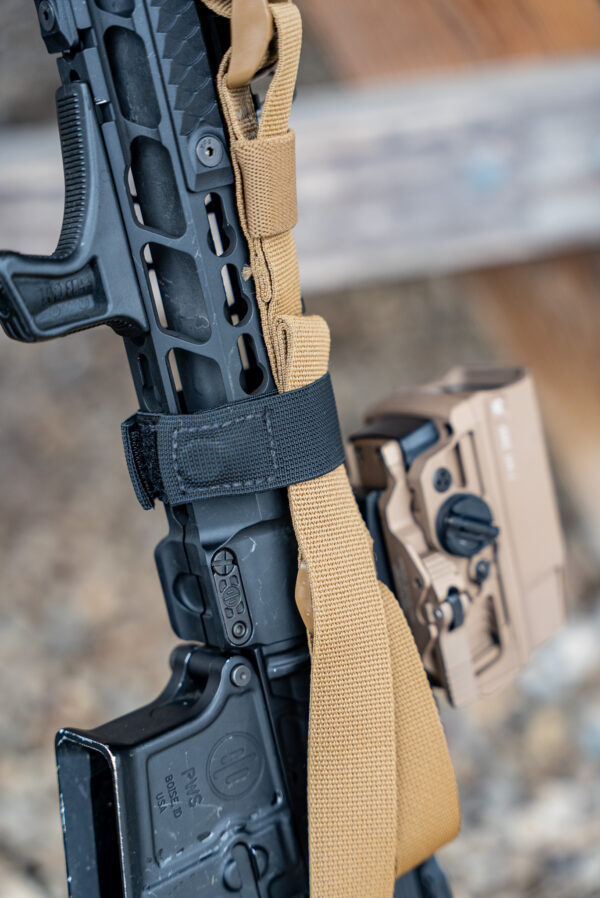 black sentry strap on rifle.