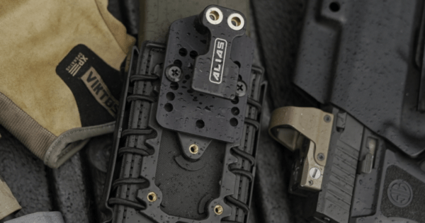 The Alias OWB Adapter attached to an OWB holster.