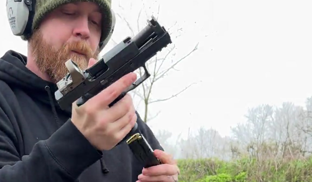 A man praticing reload drills using the NeoMag.