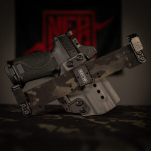 NeoMag Black Multicam Beltless Receiver with Smith and Wesson M&P in holster.
